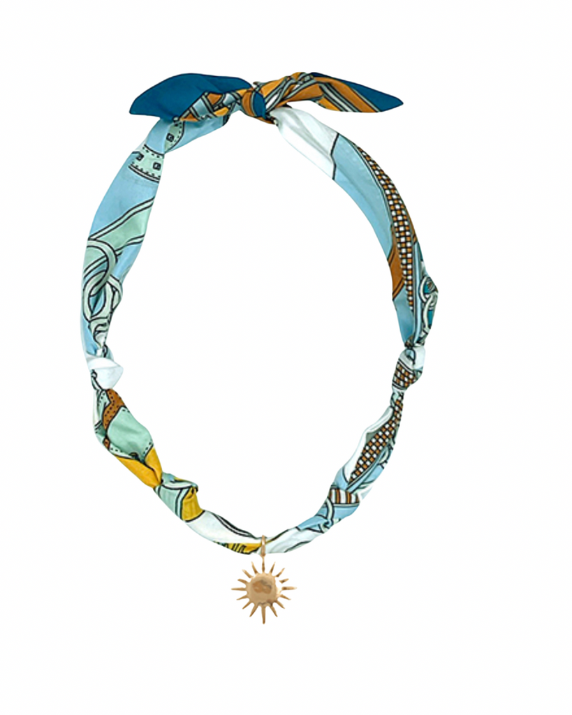 Scarf with starburst charm