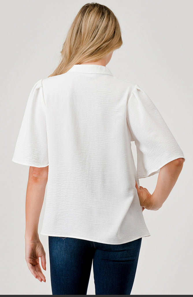 White flutter sleeve blouse