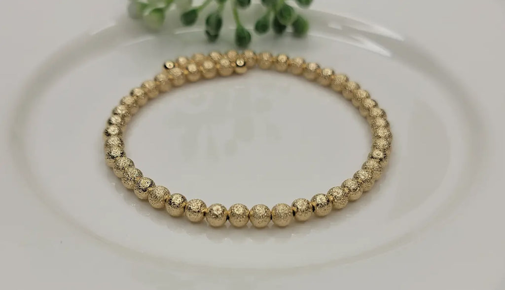 Gold round bead bracelet
