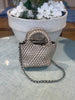 Champagne woven crossbody bag