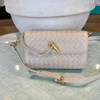 Beige woven crossbody