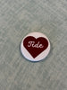 Small heart tide button