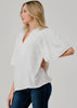 White flutter sleeve blouse